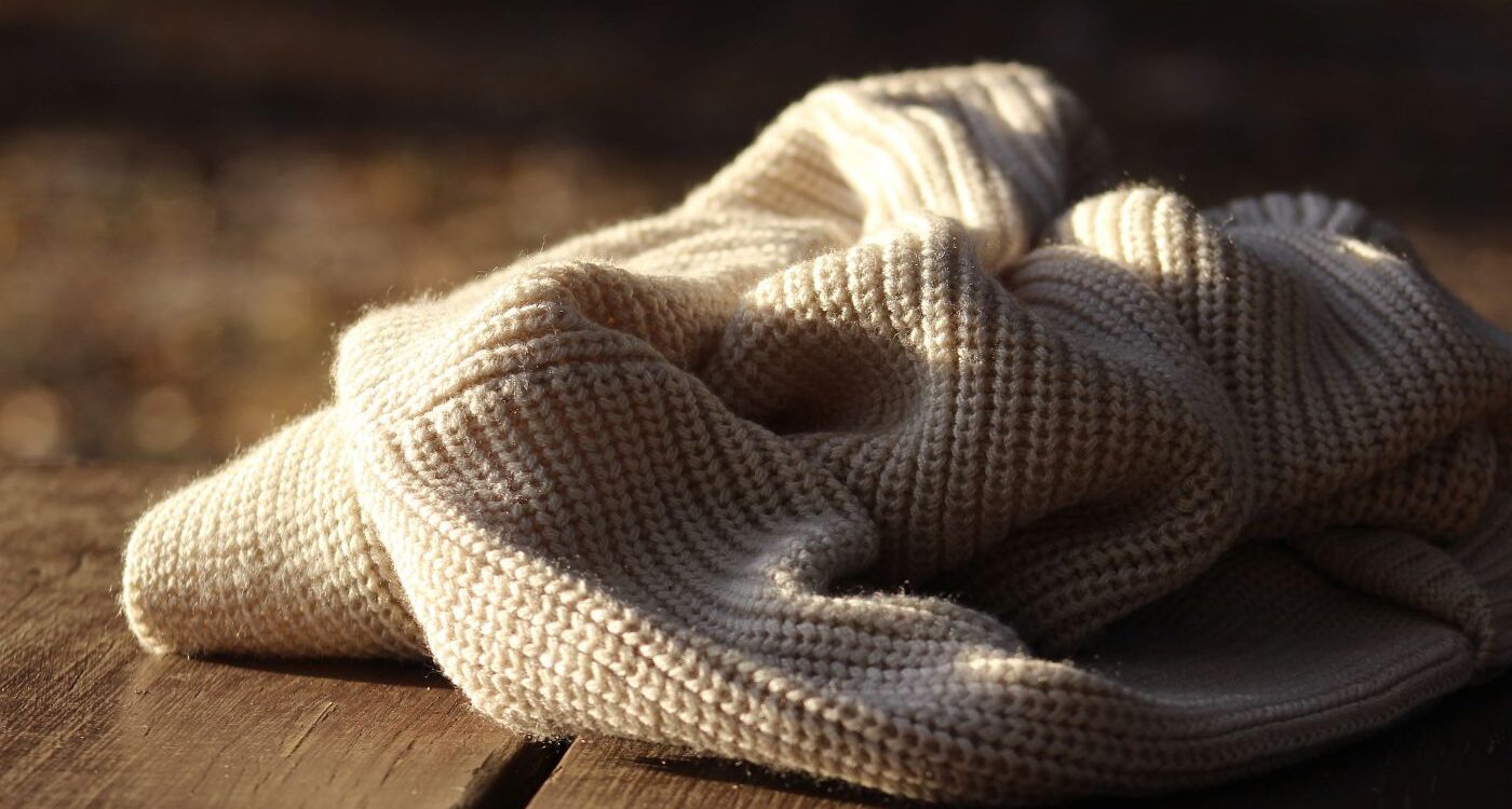 White sweater lying on floor - The Morning My Critical Inner Voice Stopped Talking