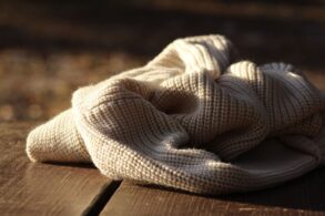 White sweater lying on floor - The Morning My Critical Inner Voice Stopped Talking