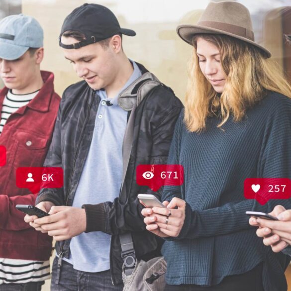 Four young people standing beside each other on cell phones - Common Unity: The Best Way to Find It in the Age of AI