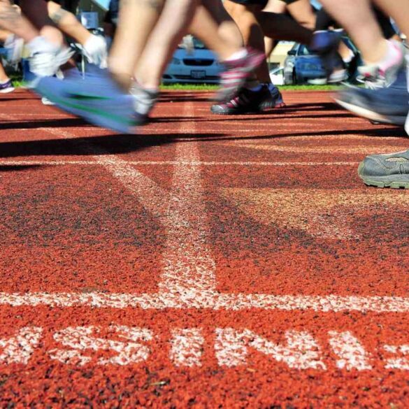 Runners crossing finish line outdoors - Finish Line: A Blissful Return to Triathlon After 10 Years