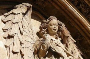 Stone angel over entrance of Llotja de Palma - Angelic Imagery: A Jungian Perspective