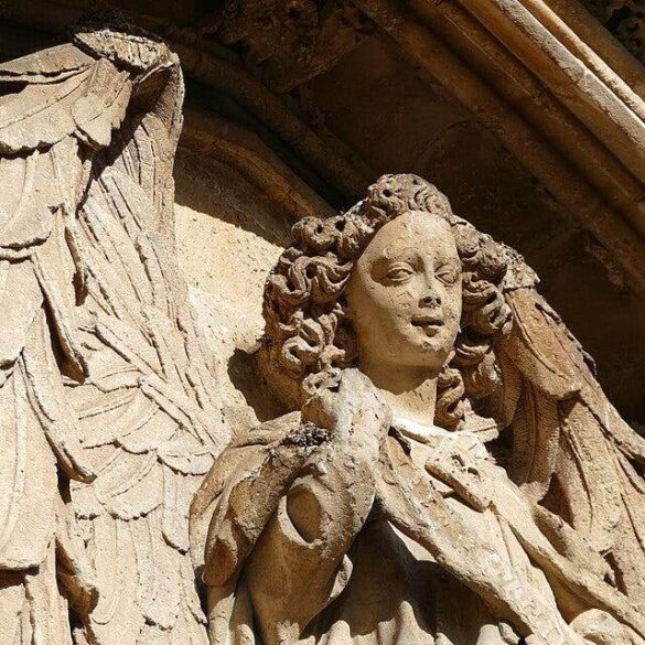 Stone angel over entrance of Llotja de Palma - Angelic Imagery: A Jungian Perspective