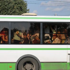 Outside view of public bus crowded with riders - Renunciation: How the 4 Noble Truths Can Help You Practice