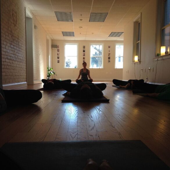 Students lying on floor on Yoga mats - Small Steps Will Quietly Lead You to the Summit of Meditation