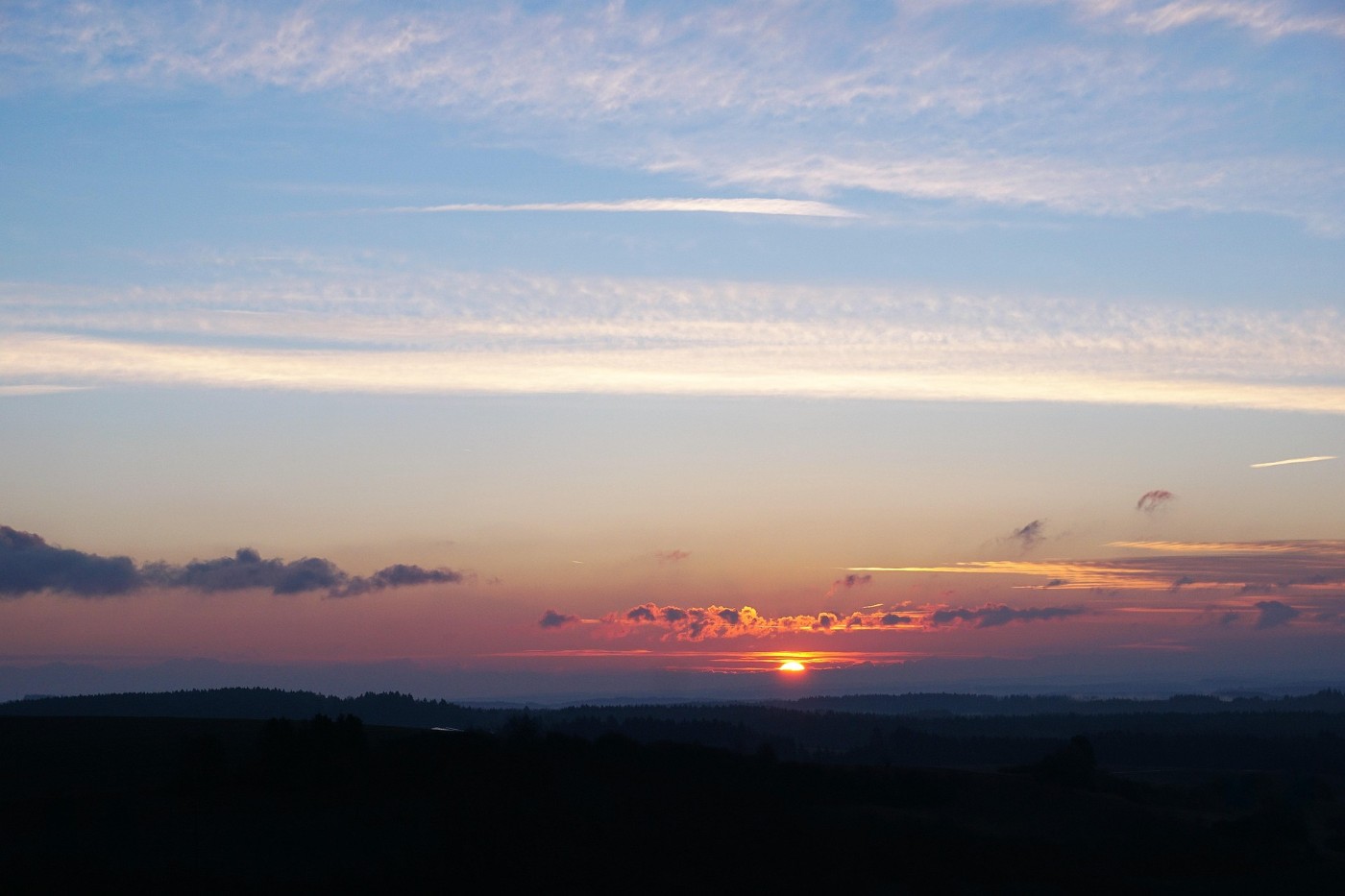 WHEN LIFE BREAKS YOU OPEN: Finding the silver lining in the midst of clouds 13 Clouds with silver lining and sun in distance - Finding the Silver Lining When Life Breaks You Open