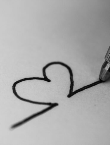 Black pen drawing heart on white paper - Mindfulness and Art: The Value of Small Repetitive Movements