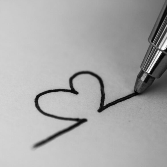 Black pen drawing heart on white paper - Mindfulness and Art: The Value of Small Repetitive Movements